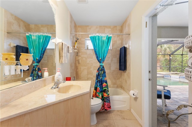 full bathroom with tile patterned floors, vanity, shower / bathtub combination with curtain, and toilet