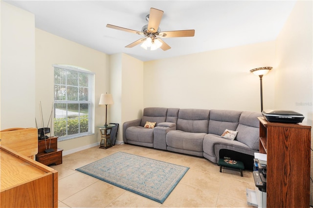 tiled living room with ceiling fan