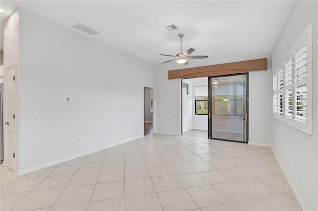 4575 Cancello Grande Ave, Venice, FL 34293 - unfurnished room with lofted ceiling, plenty of natural light, ceiling fan, and light tile patterned flooring