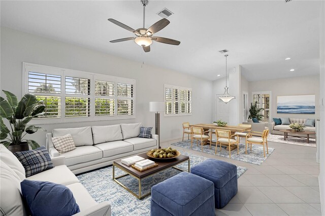 4575 Cancello Grande Ave, Venice, FL 34293 - living room featuring light tile patterned floors and ceiling fan