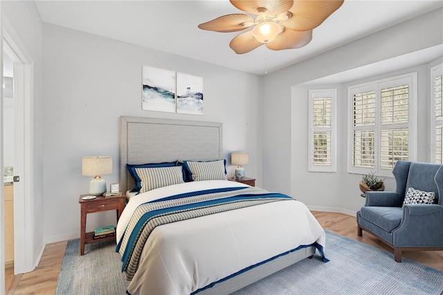 4575 Cancello Grande Ave, Venice, FL 34293 - bedroom with light hardwood / wood-style flooring and ceiling fan