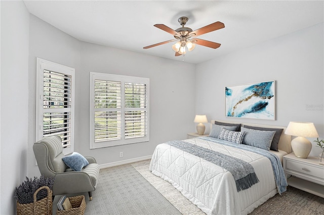 4575 Cancello Grande Ave, Venice, FL 34293 - bedroom featuring light carpet and ceiling fan
