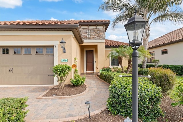 view of front of property with a garage