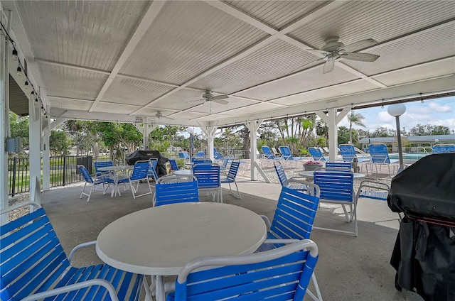 view of patio / terrace with ceiling fan and grilling area