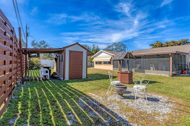 view of yard featuring a sunroom