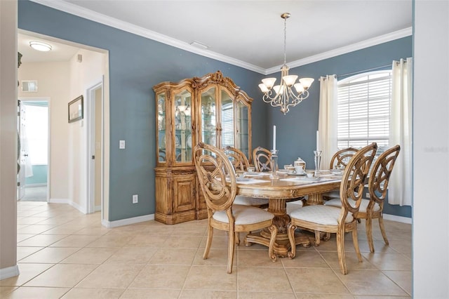 tiled dining space featuring ornamental molding and an inviting chandelier