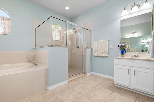 bathroom with tile patterned floors, vanity, and independent shower and bath