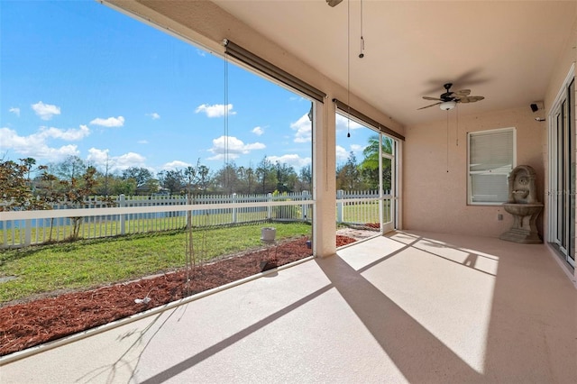 view of patio featuring ceiling fan