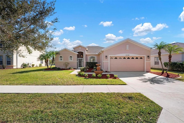 ranch-style house featuring a garage and a front lawn