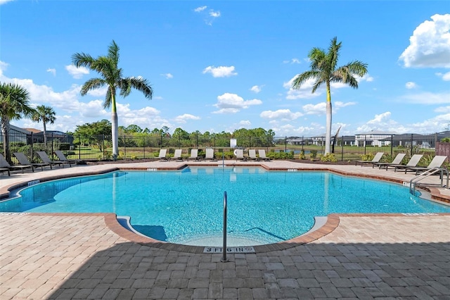 view of pool featuring a patio area