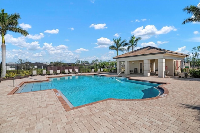 view of pool featuring a patio