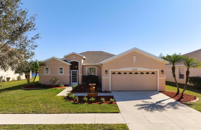 single story home featuring a front yard and a garage