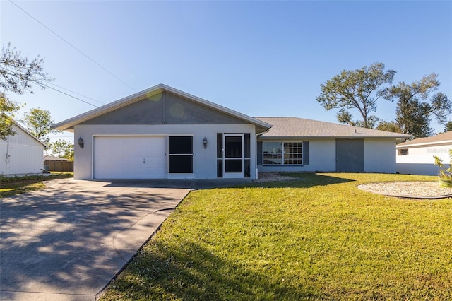 ranch-style house featuring a front yard and a garage