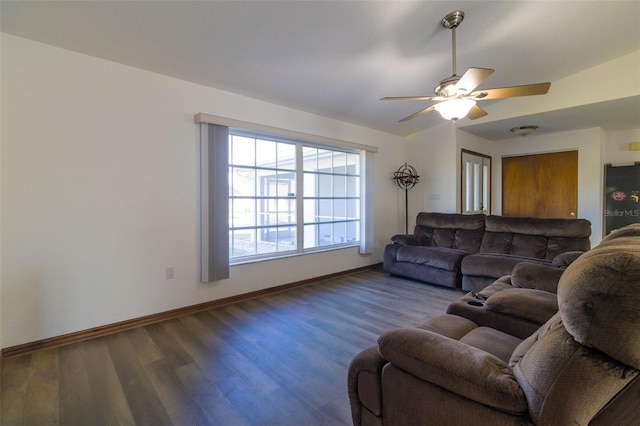 living room featuring ceiling fan and wood-type flooring