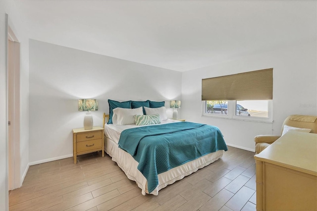 bedroom with light wood-type flooring