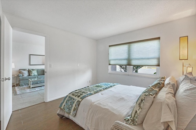 bedroom featuring a textured ceiling