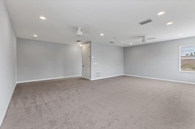 carpeted empty room featuring ceiling fan