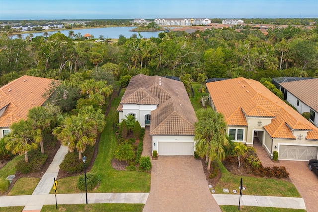 birds eye view of property featuring a water view