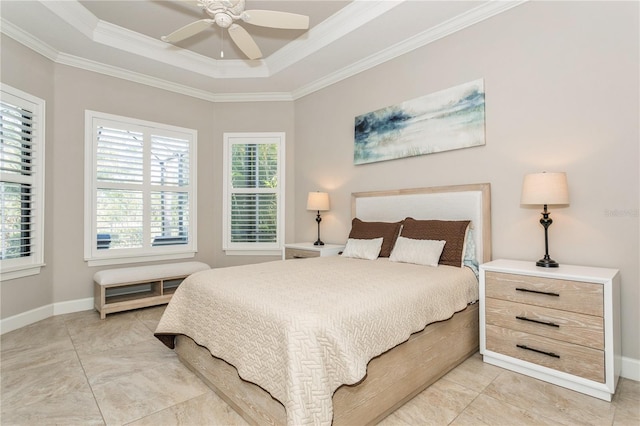 tiled bedroom featuring ceiling fan, a tray ceiling, and crown molding