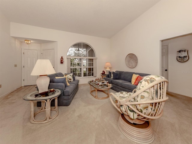 carpeted living room with lofted ceiling