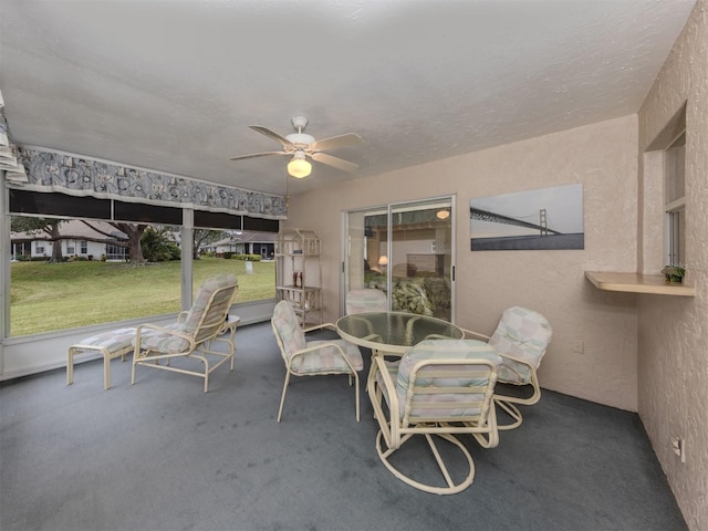 view of patio / terrace featuring ceiling fan