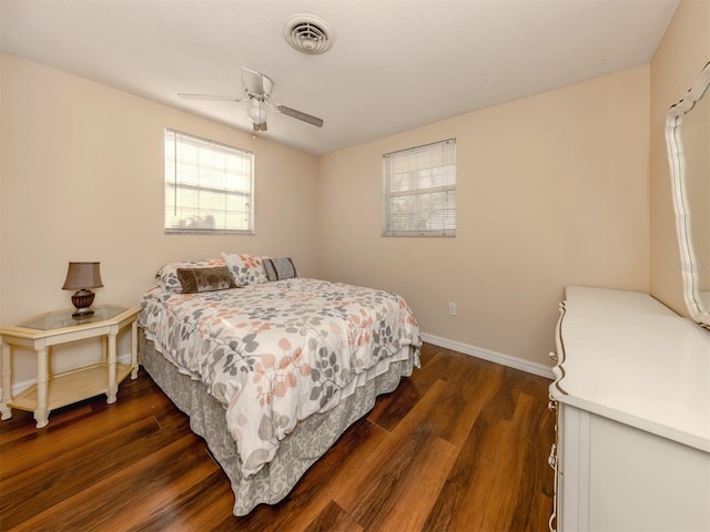 bedroom featuring dark wood-type flooring and ceiling fan