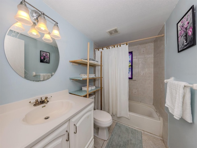 full bathroom with a textured ceiling, shower / tub combo with curtain, tile patterned flooring, toilet, and vanity