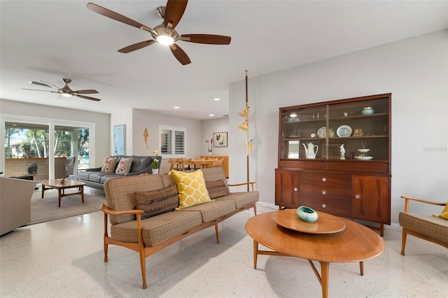 living room featuring ceiling fan