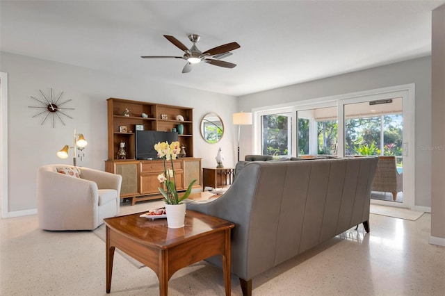 living room with ceiling fan