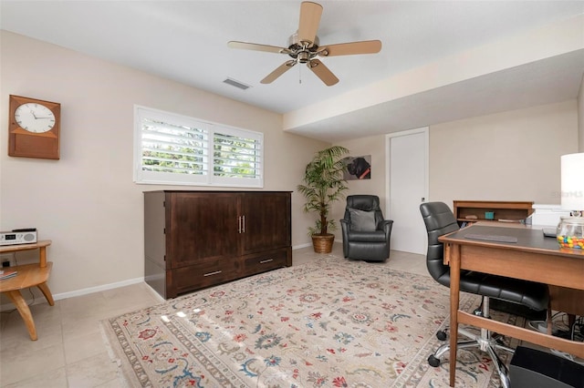 tiled office space with ceiling fan