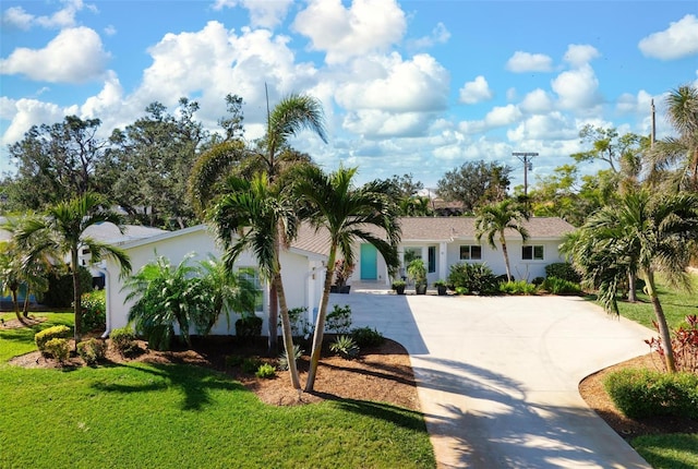 view of front of property with a front lawn