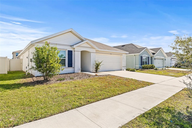 ranch-style home with a front lawn and a garage