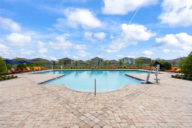 16766 Carlton Pond St, Wimauma, FL 33598 - view of pool featuring a patio