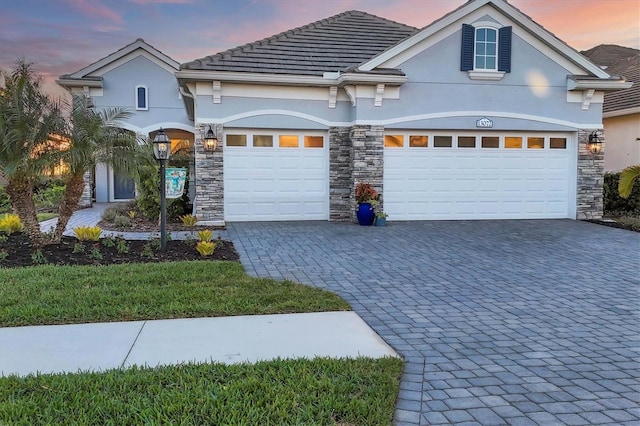 view of front of property featuring a garage