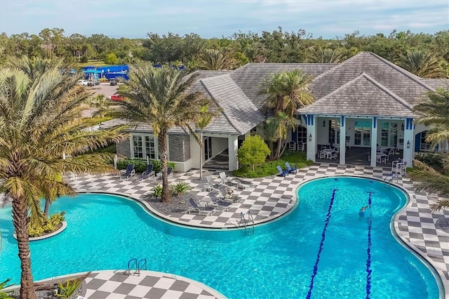 view of swimming pool with a patio