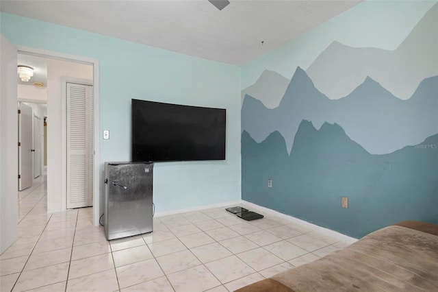 unfurnished living room featuring light tile patterned floors