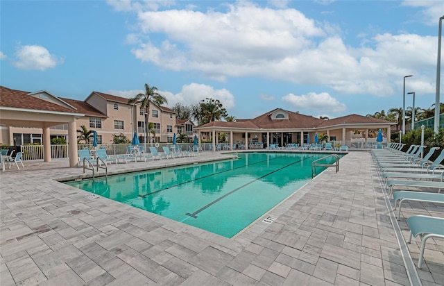 view of swimming pool featuring a patio area