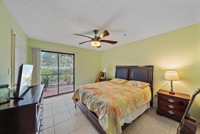 tiled bedroom featuring ceiling fan, access to outside, and a textured ceiling