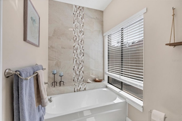 bathroom with a tub