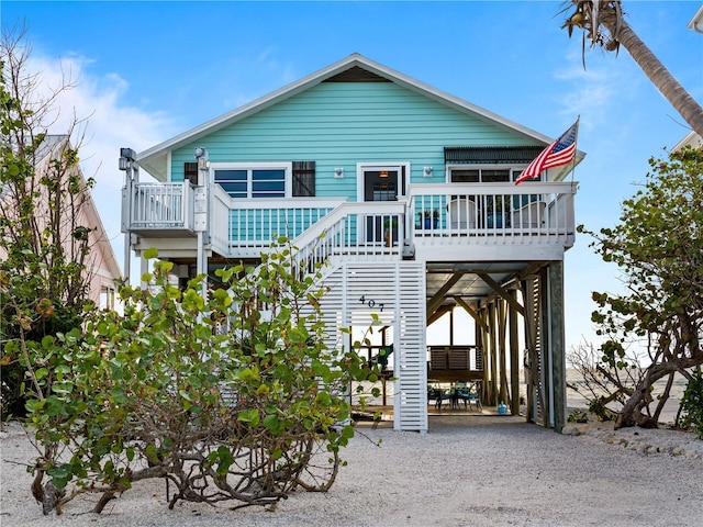 view of front of property featuring a carport