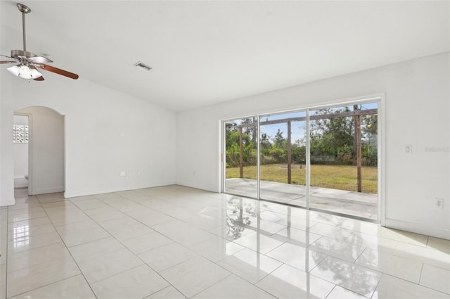 unfurnished room featuring light tile patterned floors and ceiling fan