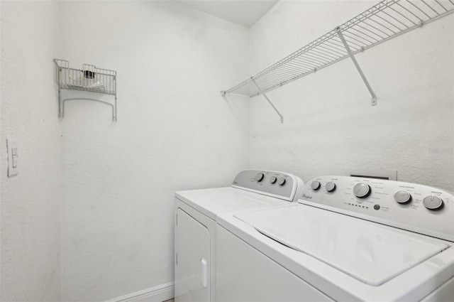 laundry area featuring washer and clothes dryer