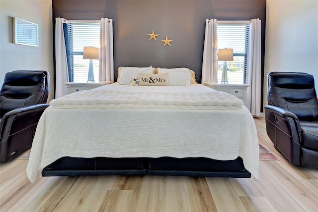 bedroom featuring light wood-type flooring