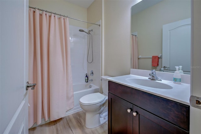 full bathroom with shower / bathtub combination with curtain, wood-type flooring, toilet, and vanity