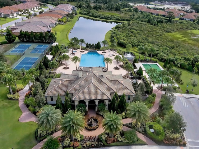 birds eye view of property featuring a water view