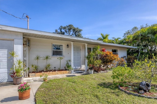 view of front of home with a front yard