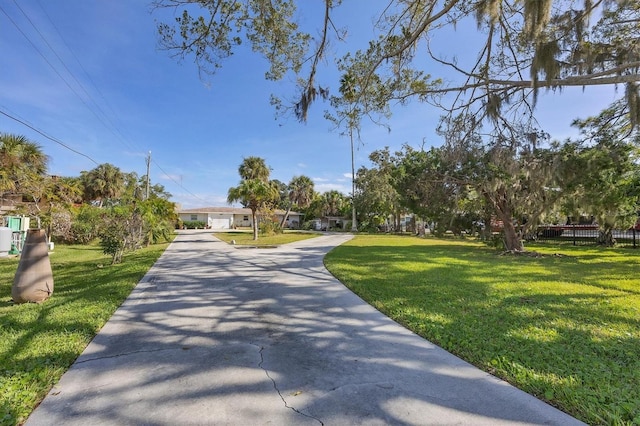 view of community featuring a yard