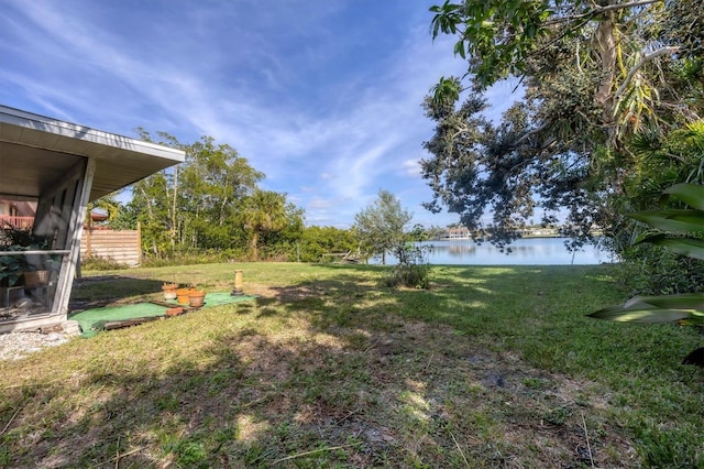 view of yard with a water view