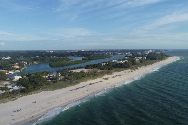 bird's eye view with a water view and a view of the beach