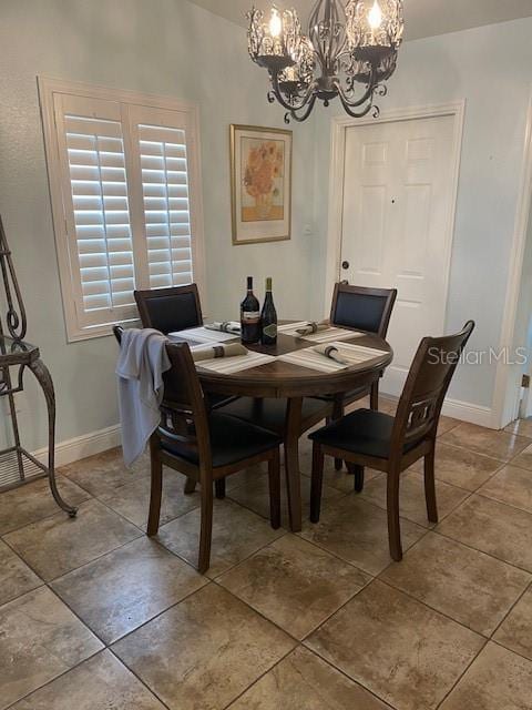 dining room featuring an inviting chandelier